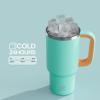 image32 oz Tumbler with Handle and Straw Stainless Steel Insulated Tumbler Keeps Cold for 24 Hours Leakproof Travel Cup Fits in Cup Holder and BPAFree Beaucoup BlueSoft Cyan